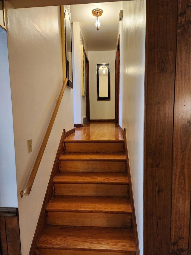 14842 Shepard Dr, Dolton, IL 60419 - staircase with wood finished floors