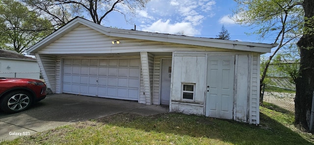 detached garage with fence