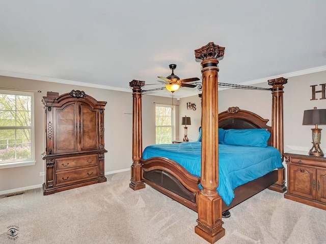 bedroom featuring visible vents, carpet, baseboards, and crown molding