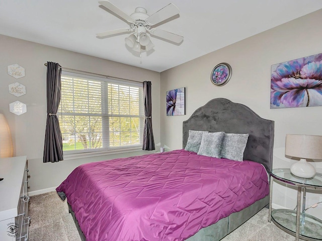 bedroom featuring carpet flooring, baseboards, and ceiling fan