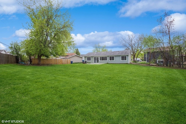 view of yard featuring fence