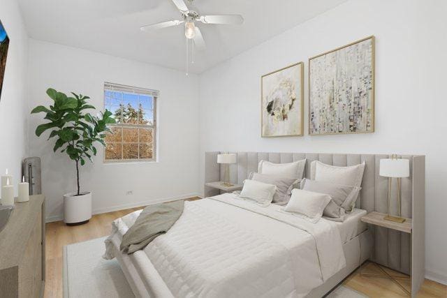 bedroom featuring a ceiling fan, baseboards, and light wood-type flooring
