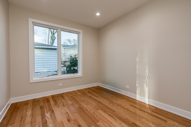 616 Glendale Rd, Glenview, IL 60025 - empty room featuring recessed lighting, baseboards, visible vents, and light wood finished floors
