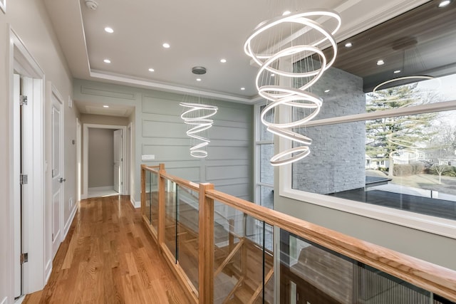 616 Glendale Rd, Glenview, IL 60025 - corridor with a notable chandelier, light wood-type flooring, baseboards, an upstairs landing, and recessed lighting