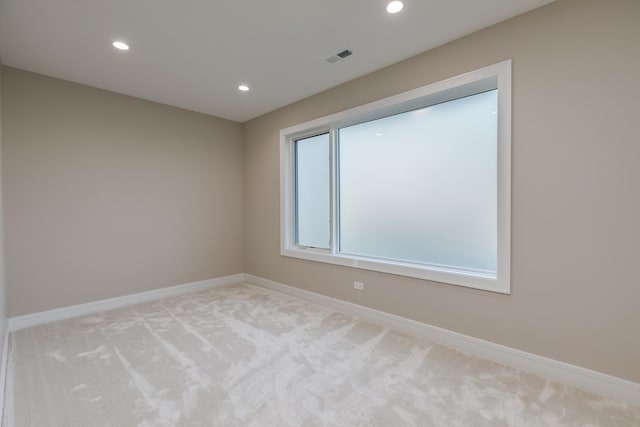 616 Glendale Rd, Glenview, IL 60025 - unfurnished room with recessed lighting, baseboards, visible vents, and light carpet