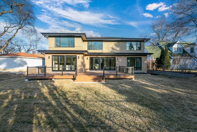 616 Glendale Rd, Glenview, IL 60025 - rear view of property with a lawn, a wooden deck, and fence