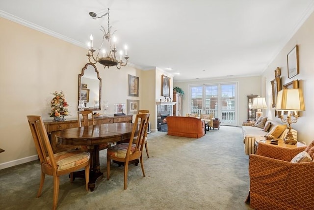 1865 Old Willow Rd Unit 231, Northfield, IL 60093 - dining space with a warm lit fireplace, a chandelier, ornamental molding, and carpet