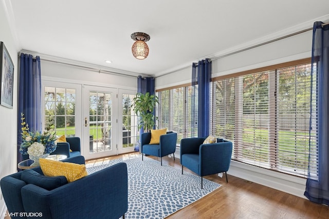 30 Rue Foret, Lake Forest, IL 60045 - living area featuring crown molding, plenty of natural light, french doors, and wood finished floors