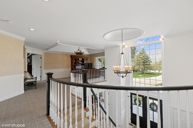 30 Rue Foret, Lake Forest, IL 60045 - hall featuring an upstairs landing, a chandelier, ornamental molding, carpet flooring, and a wainscoted wall