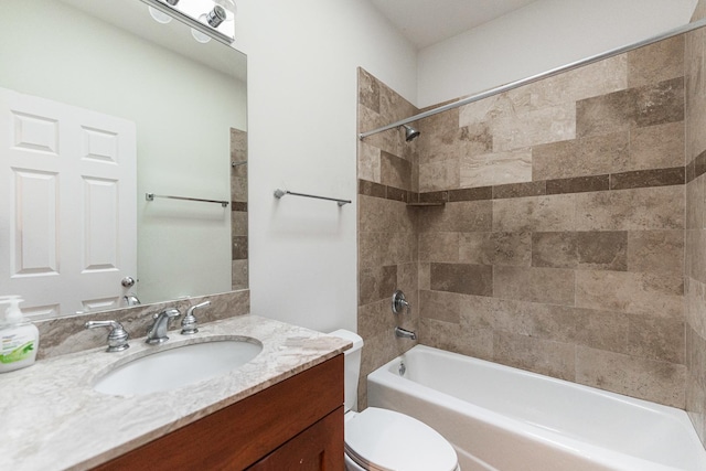 full bath with toilet, washtub / shower combination, and vanity