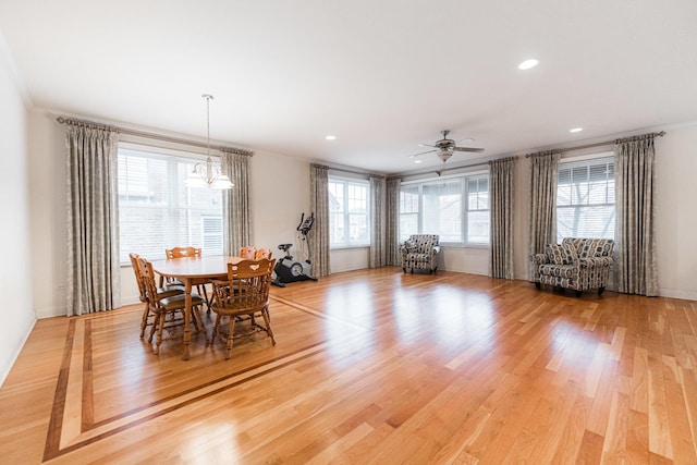 dining room with crown molding, recessed lighting, a ceiling fan, and light wood finished floors