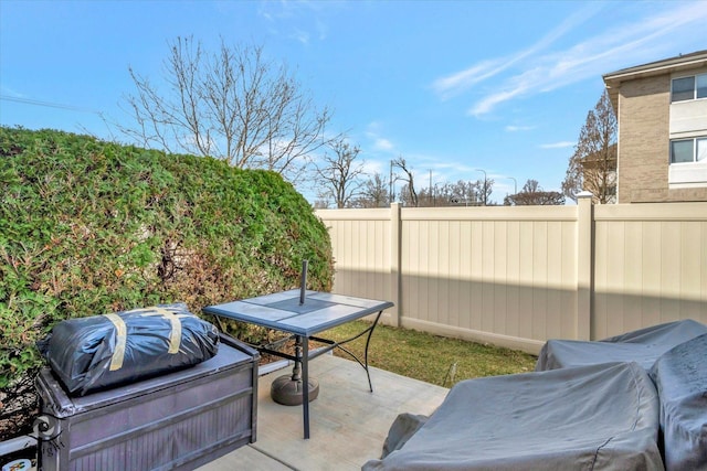 view of patio / terrace featuring fence and area for grilling