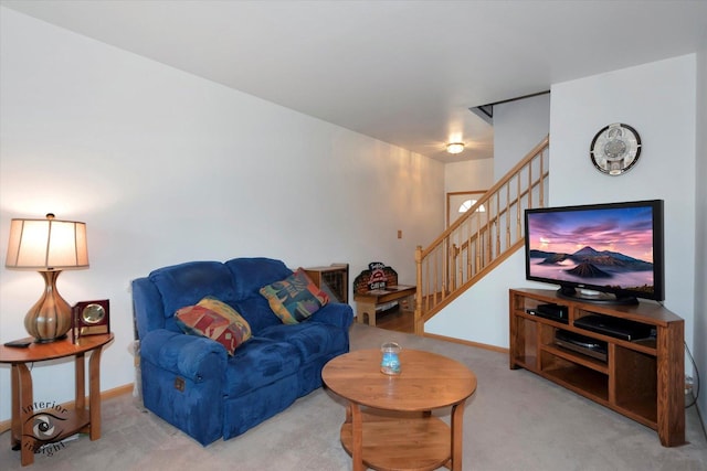 living room featuring stairway, carpet floors, and baseboards