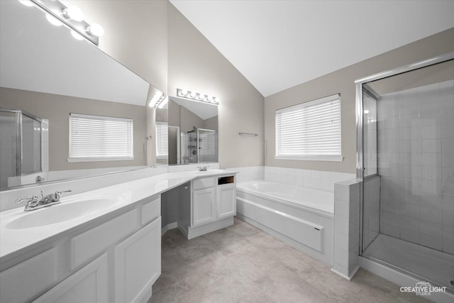 1207 Pennsbury Ln, Aurora, IL 60502 - bathroom with a shower stall, lofted ceiling, a bath, and double vanity