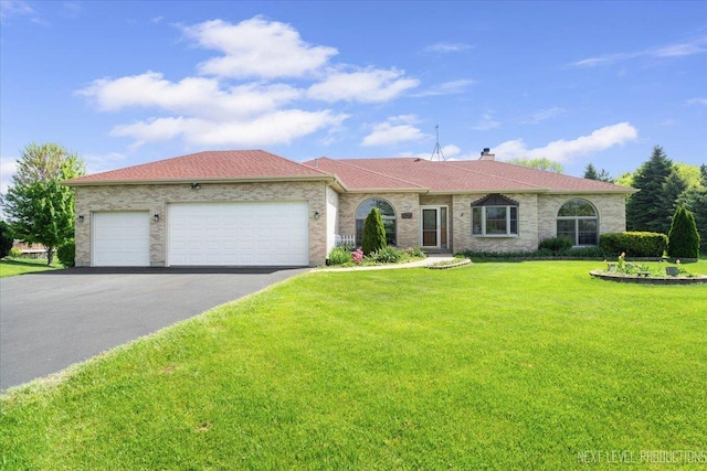 46W306 Woodview Pkwy, Hampshire, IL 60140 - ranch-style house with asphalt driveway, an attached garage, a front yard, a chimney, and roof with shingles