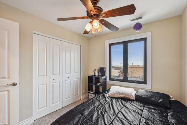5652 W 63rd St Unit 3E, Chicago, IL 60638 - carpeted bedroom featuring baseboards, a ceiling fan, a closet, and visible vents