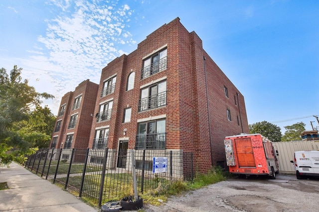 5652 W 63rd St Unit 3E, Chicago, IL 60638 - view of property with fence