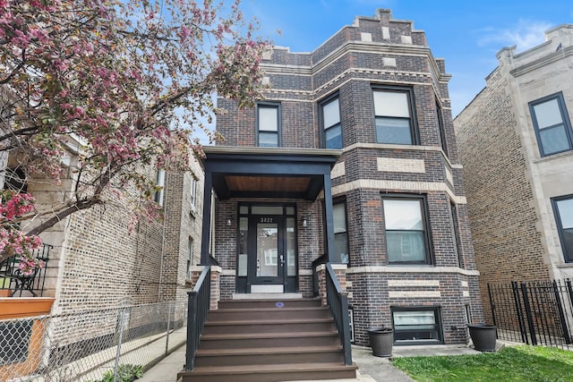 3237 W Cortez St, Chicago, IL 60651 - second empire-style home featuring brick siding and fence