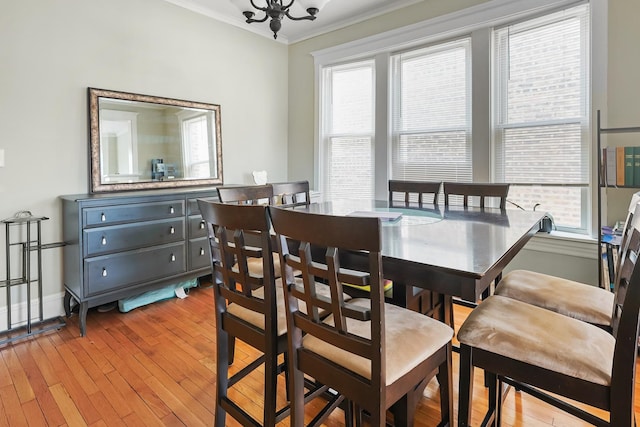 3237 W Cortez St, Chicago, IL 60651 - dining room with crown molding and light wood-type flooring