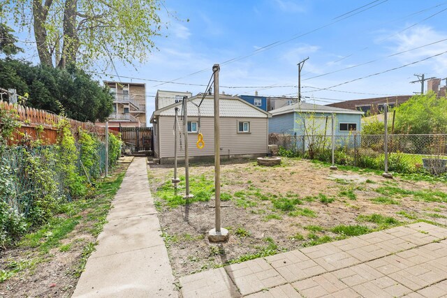 3237 W Cortez St, Chicago, IL 60651 - view of yard with a fenced backyard