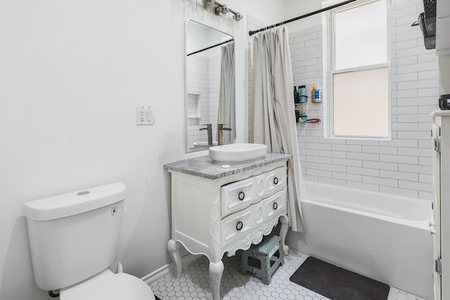 3237 W Cortez St, Chicago, IL 60651 - bathroom featuring shower / bath combo with shower curtain, toilet, and vanity
