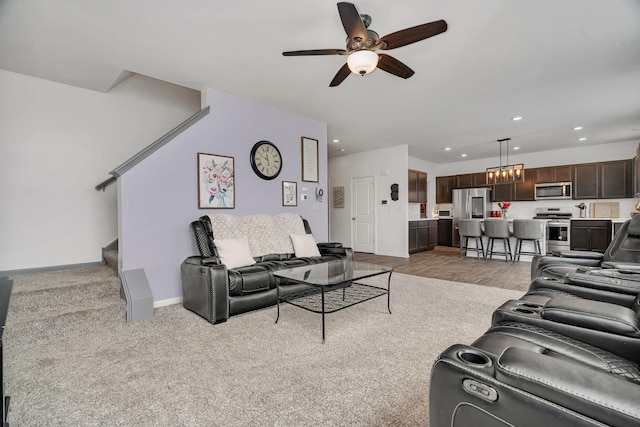1825 Spencer Way, Shorewood, IL 60404 - living area with baseboards, stairs, recessed lighting, and ceiling fan with notable chandelier