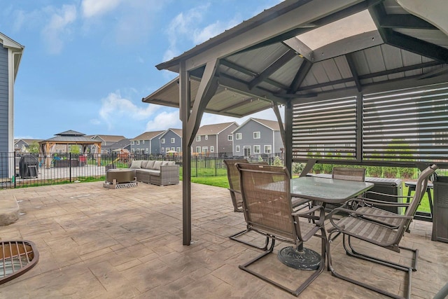 1825 Spencer Way, Shorewood, IL 60404 - view of patio with outdoor dining area, fence, an outdoor hangout area, a residential view, and a gazebo