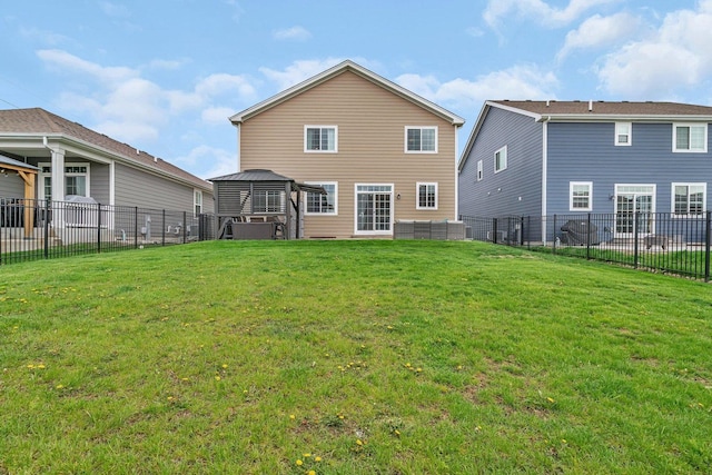 1825 Spencer Way, Shorewood, IL 60404 - back of house featuring a gazebo, a lawn, and a fenced backyard
