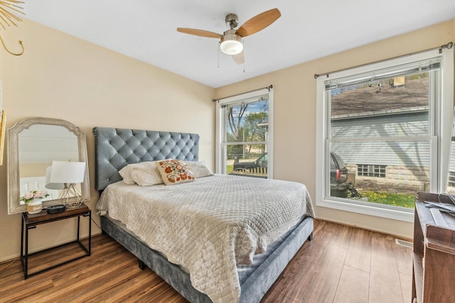 26312 W Blackhawk Ave, Ingleside, IL 60041 - bedroom with a ceiling fan, visible vents, and wood finished floors