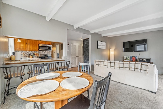 26312 W Blackhawk Ave, Ingleside, IL 60041 - carpeted dining area featuring beamed ceiling