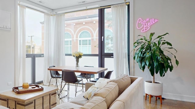 1350 N Claremont Ave Unit 2, Chicago, IL 60622 - living room featuring baseboards and wood finished floors