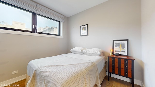 1350 N Claremont Ave Unit 2, Chicago, IL 60622 - bedroom featuring wood finished floors and baseboards