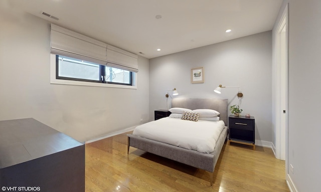 1350 N Claremont Ave Unit 2, Chicago, IL 60622 - bedroom with light wood finished floors, recessed lighting, and baseboards