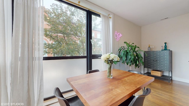 1350 N Claremont Ave Unit 2, Chicago, IL 60622 - dining area featuring wood finished floors