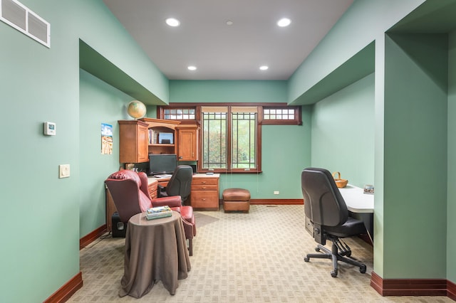 office space featuring visible vents, recessed lighting, baseboards, and light colored carpet