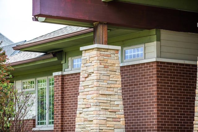 details featuring a shingled roof