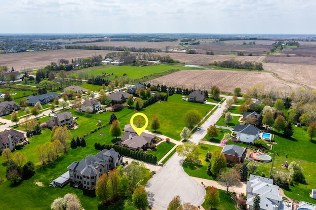 bird's eye view with a rural view and a residential view