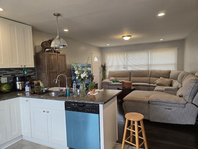 3109 Sussex Ave, Markham, IL 60428 - kitchen featuring a sink, open floor plan, dishwashing machine, and a peninsula