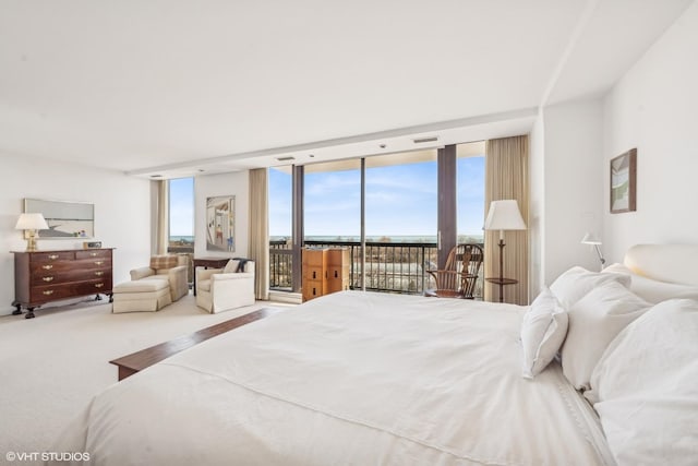 2314 N Lincoln Park W Unit 8-9S, Chicago, IL 60614 - carpeted bedroom with floor to ceiling windows and access to exterior