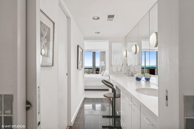 2314 N Lincoln Park W Unit 8-9S, Chicago, IL 60614 - full bathroom featuring a healthy amount of sunlight, tile patterned flooring, ensuite bathroom, and visible vents