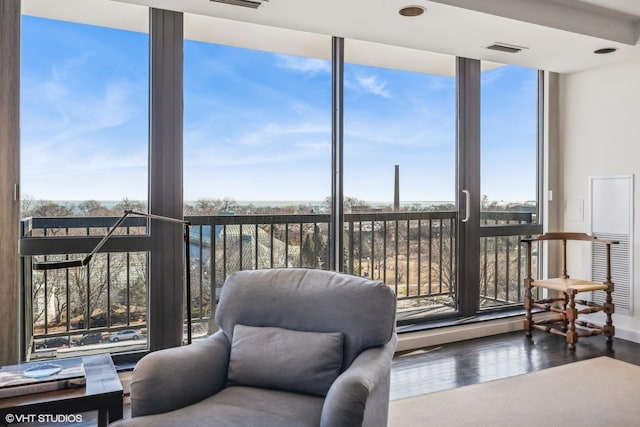 2314 N Lincoln Park W Unit 8-9S, Chicago, IL 60614 - living area with visible vents, expansive windows, wood finished floors, and a wealth of natural light