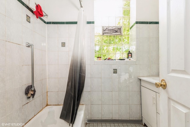 7422 S Kimbark Ave, Chicago, IL 60619 - full bathroom featuring shower / bath combo with shower curtain, tile walls, and vanity