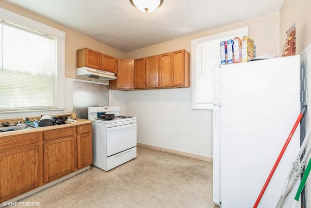 7422 S Kimbark Ave, Chicago, IL 60619 - kitchen with white appliances, under cabinet range hood, light floors, brown cabinetry, and baseboards