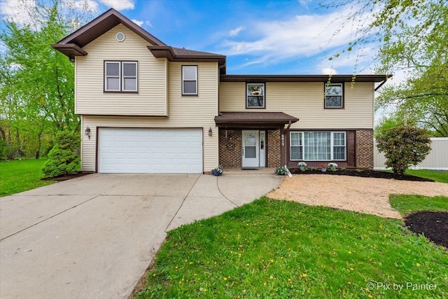 8015 S Carrolton Ct, Hanover Park, IL 60133 - view of front facade featuring a front lawn, driveway, brick siding, and a garage
