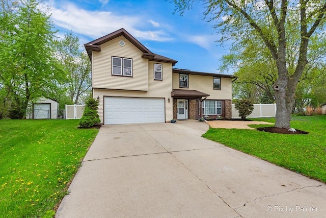 8015 S Carrolton Ct, Hanover Park, IL 60133 - view of front of house featuring fence, a garage, a front lawn, and concrete driveway