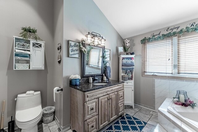 full bath featuring a bath, visible vents, vanity, toilet, and lofted ceiling