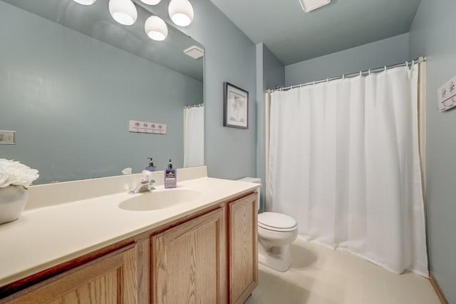 227 N Hickory St, Cortland, IL 60112 - bathroom with toilet, vanity, and curtained shower