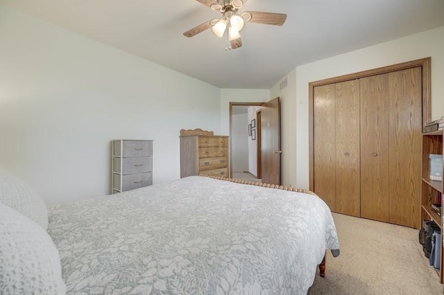 227 N Hickory St, Cortland, IL 60112 - bedroom with light colored carpet, a closet, and ceiling fan