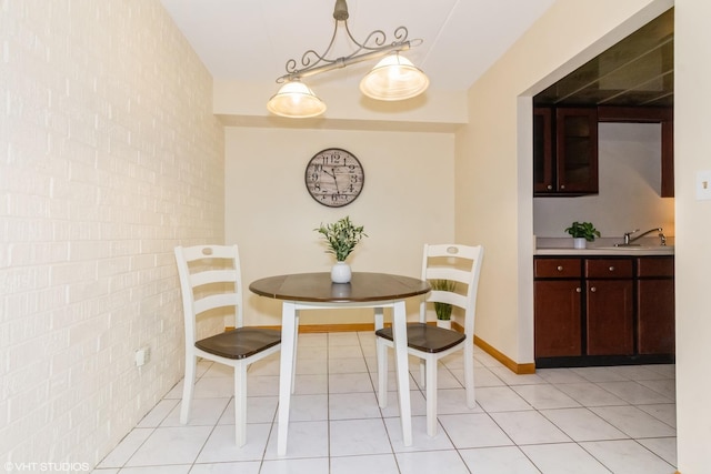 dining area featuring light tile patterned floors