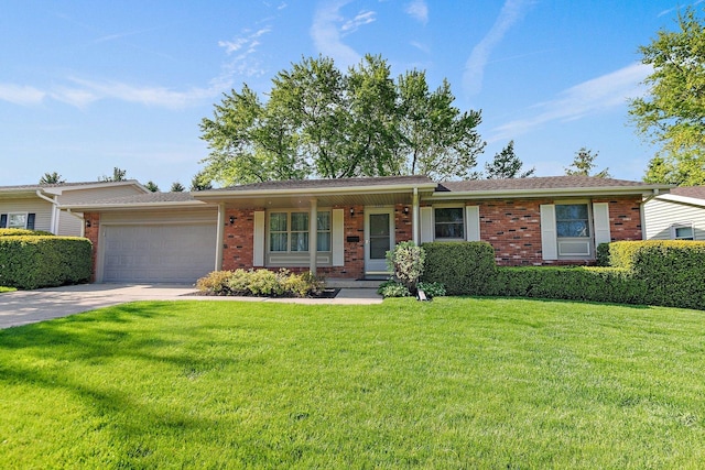 2206 Highland Dr, Sycamore, IL 60178 - single story home featuring brick siding, a garage, a front lawn, and concrete driveway